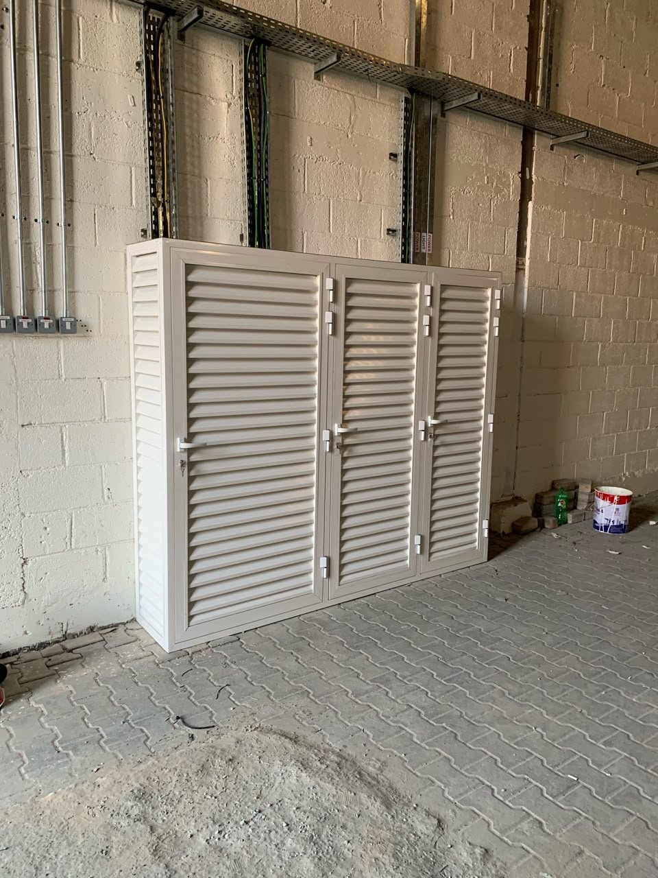 Electrical louvered enclosure installation